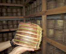 A bamboo wrapped tong of puer cakes.