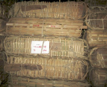 Large amounts of puer cakes traditionally wrapped in bamboo packages.
