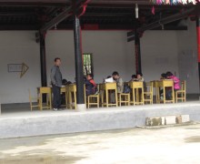 Children learning in a temple room