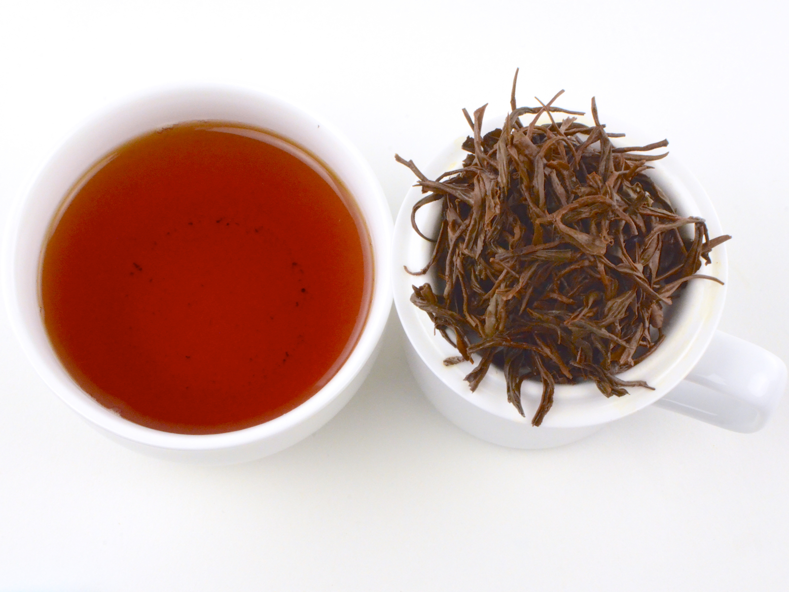 Черный чай желудок. Чай Кимун. Keemun Black Tea. Цимэнь Хун ча. Черный чай Кимун.