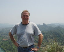 Austin standing on a mountaintop in Wuyishan.