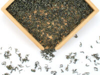 Mengding Maofeng (Feather Peak) green tea dry leaves.