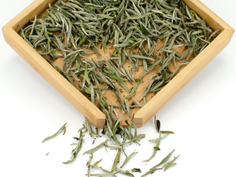 Baihao Yinzhen (Silver Needle) dry tea leaves.