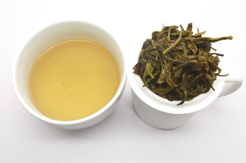 Da Shan Tian (Sweet Mountain) 2015 sheng puer tea and strained leaves.