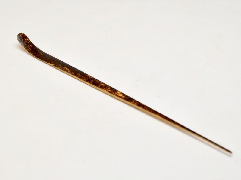 A purple bamboo matcha scoop, alternate angle.