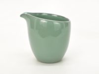 Official Kiln plum green ceramic tea pitcher, profile view