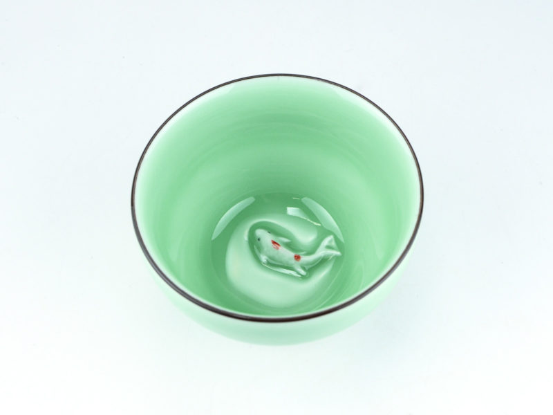 Fish swimming in the bottom of the Large Koi Fish Celadon Teacup