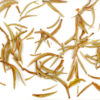 Bai Long Xu (White Dragon Whiskers) Yunnan white tea leaves floating in clear water.