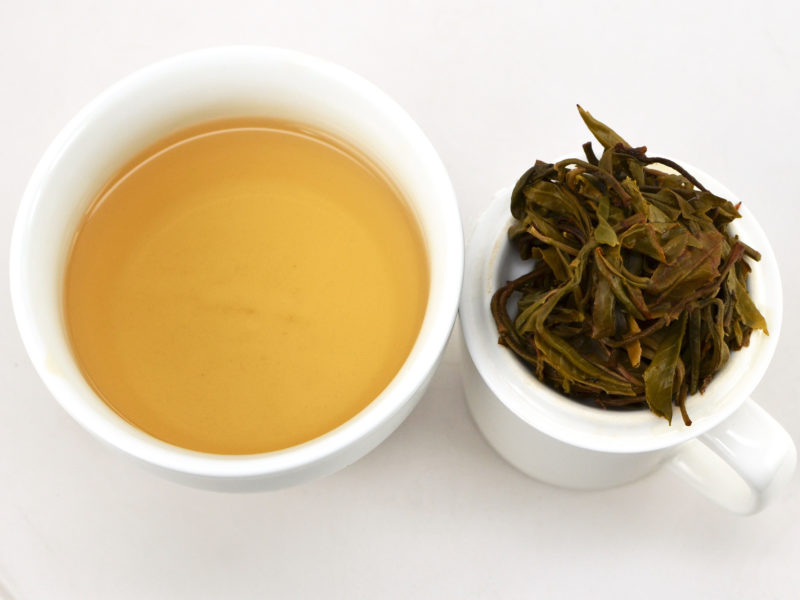 Tian Shui Sweet Water sheng puer tea and strained leaves.