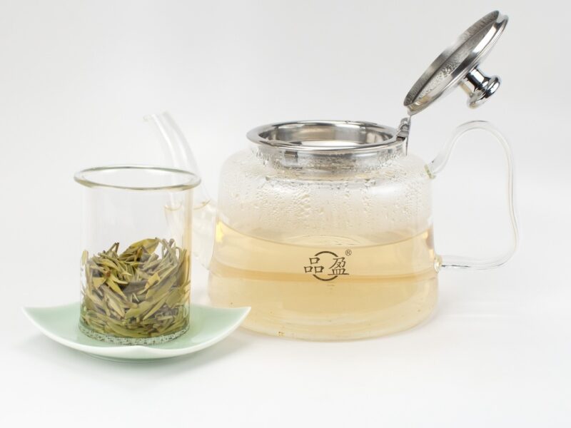 Ear Handle Glass Teapot with Glass Strainer with lid open and strainer removed.