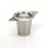 Stainless steel strainer with saucer being used as a lid.