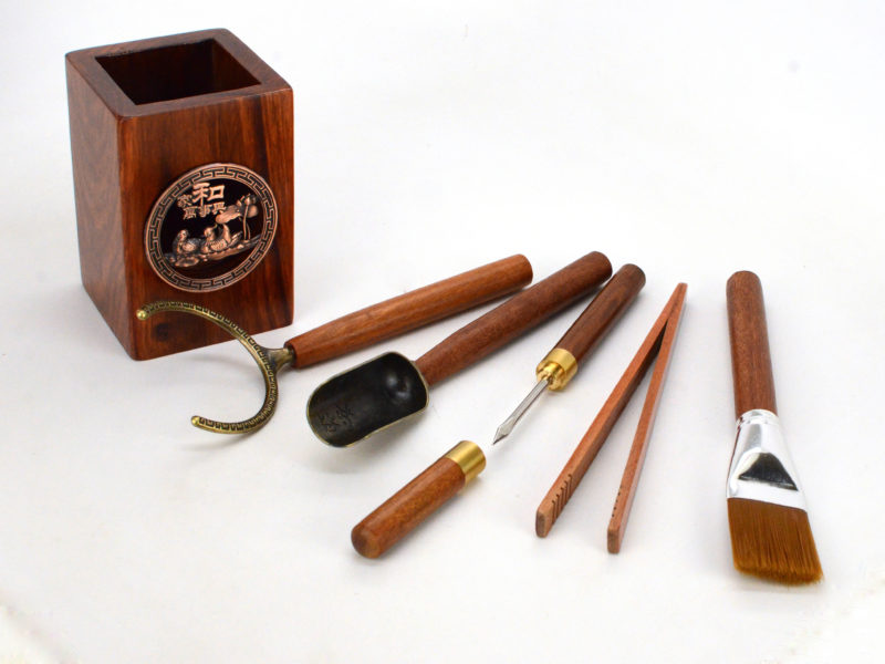 The five tools included in inlaid rosewood tea utensil set.