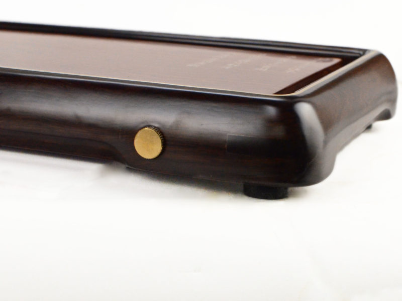 Side view of ebony and rosewood poetry tea tray.