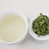 Mountain Forest Huangshan Maofeng green tea and strained leaves.