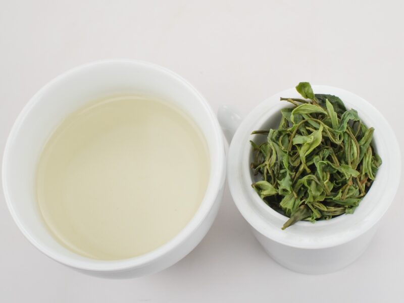 Mountain Forest Huangshan Maofeng green tea and strained leaves.