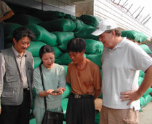 Zhuping and Austin at the Yunnan tea market with puer tea master Hu Haoming in 2005 sourcing puer mao cha
