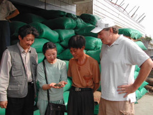 Zhuping and Austin at the Yunnan tea market with puer tea master Hu Haoming in 2005 sourcing puer mao cha