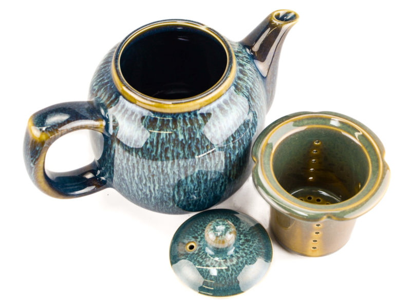 Blue Kiln Change Ceramic Teapot with filter removed and lid set aside, bluer glaze