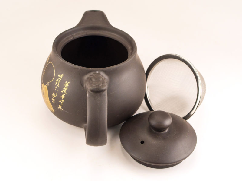 Little Monk Yixing Teapot with lid open and strainer removed.