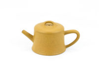 Yellow Well Fence Yixing Teapot viewed from the side.