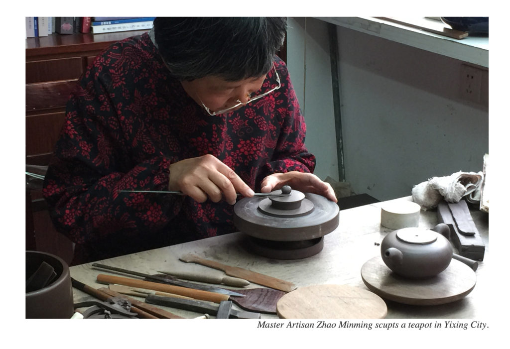 Master artisan Zhao Minming sculpts a teapot in Yixing City