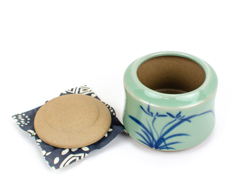 Longquan Kiln Ceramic Tea Caddy with lid open.