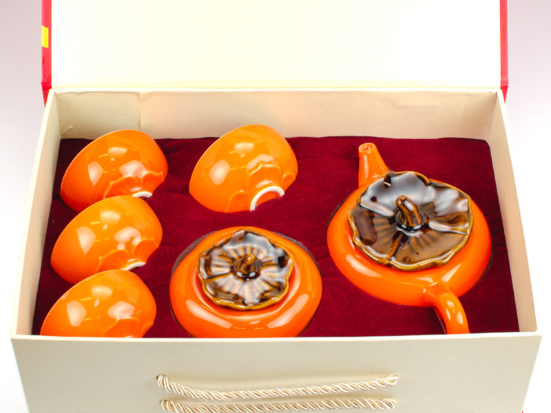 Persimmon Porcelain Tea Set safely packed in its open carrying case.