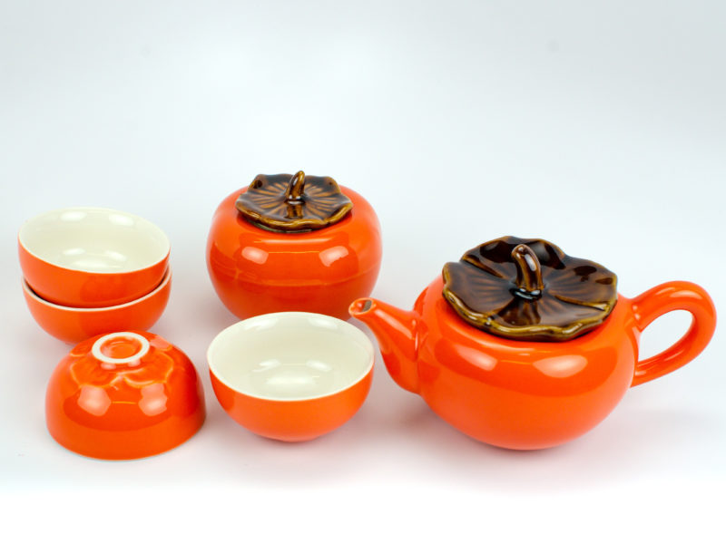Persimmon Porcelain Tea Set unpacked in all 6 pieces, including teapot, tea caddy, and 4 teacups.
