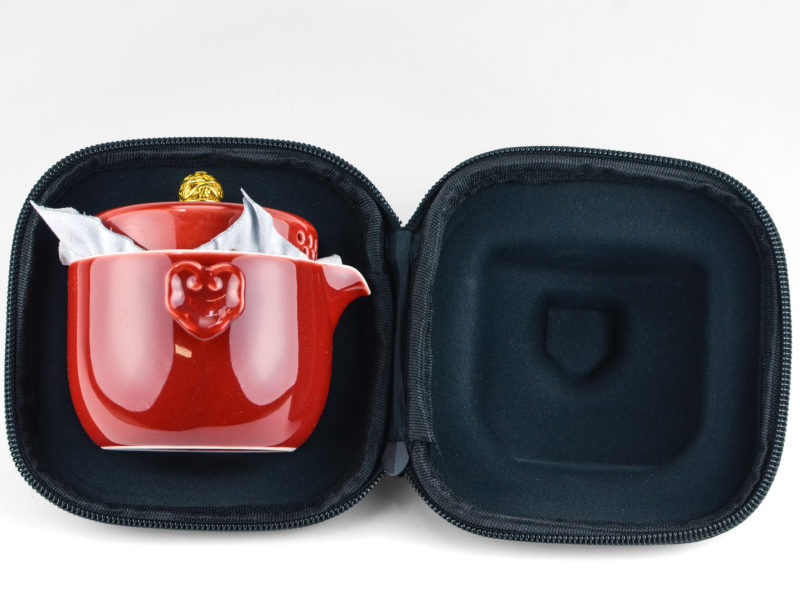 Ji Red Porcelain Travel Tea Set packed in unzipped case.