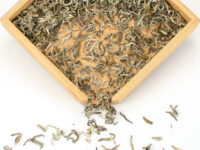 Zhi Xiang Ganlu (Gardenia Sweet Dew) scented green tea dry leaves.