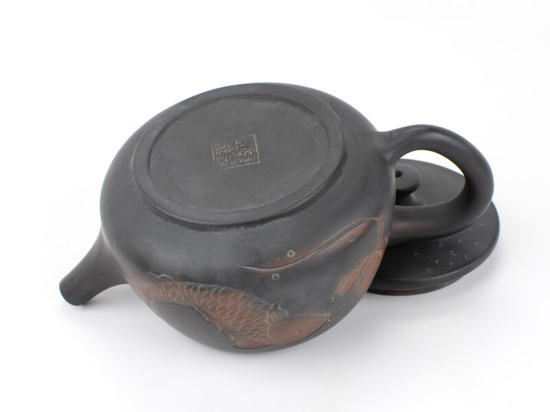 Maker's stamp on base of Fish and Lotus Carved Yunnan Black Jianshui Teapot