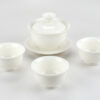 Small Suet Jade Porcelain Gaiwan and three matching teacups