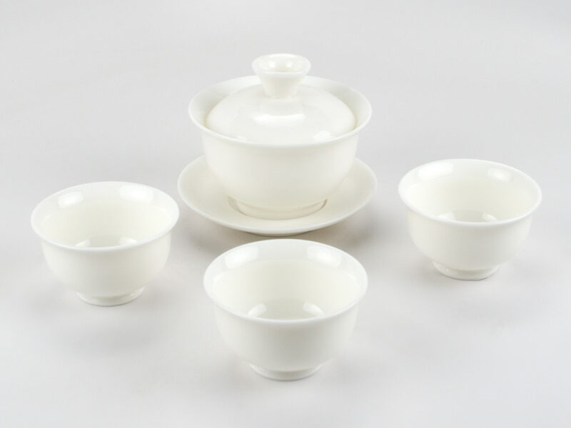 Small Suet Jade Porcelain Gaiwan and three matching teacups