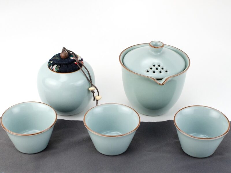 Ru Kiln Tian Qing Easy Gaiwan Travel Tea Set with cups laid out on tea towel