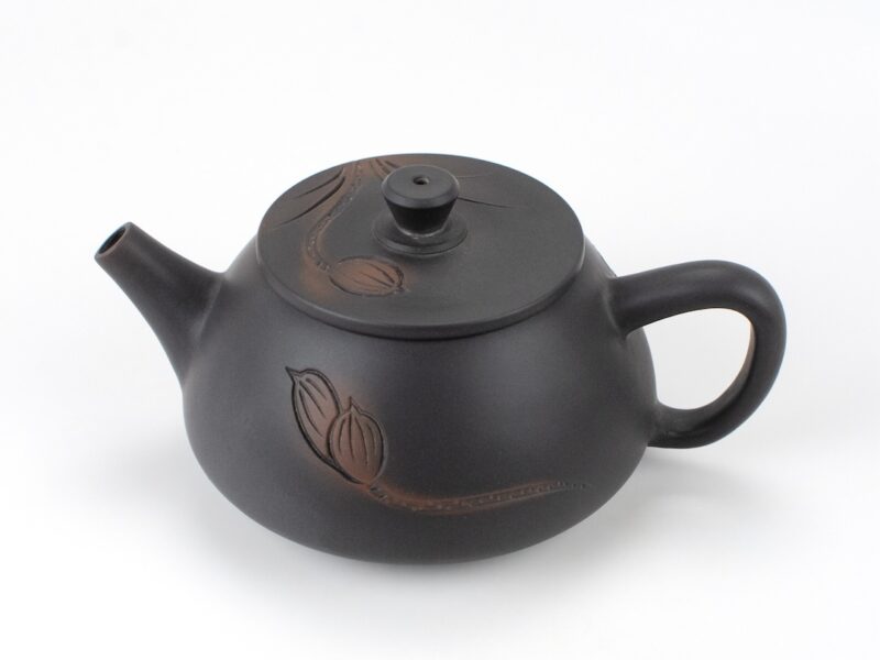 Lotus Carved Stone Scoop Yunnan Black Jianshui Teapot