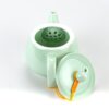 Classic Plum Green Celadon Teapot view of inset strainer behind spout