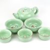 Matching Longquan Kiln Koi Fish Celadon Teapot and two different sizes of teacup.