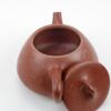 Strainer inside Plum Blossom Stone Scoop Da Hong Pao Yixing Teapot