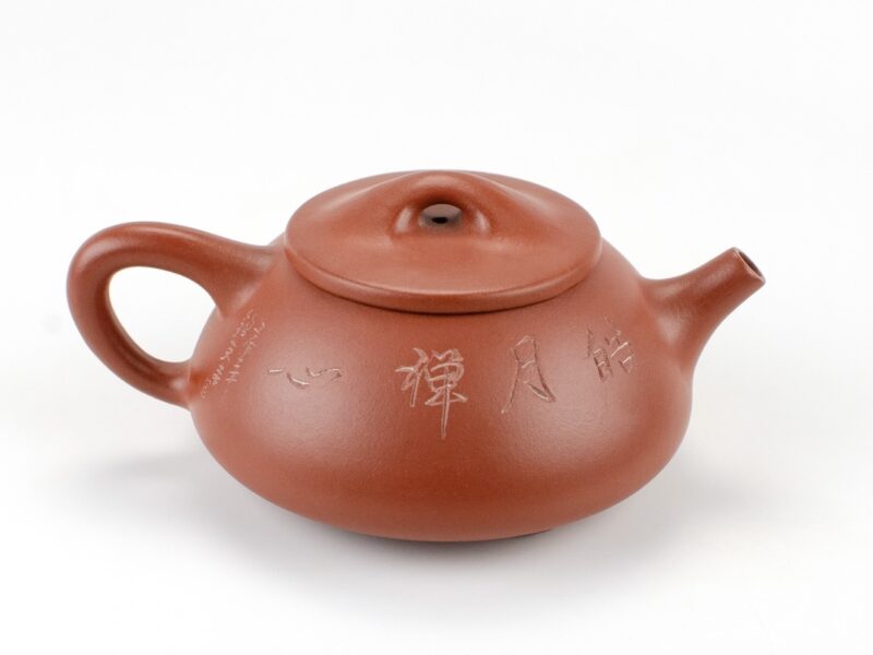 Calligraphy detail Red Stone Scoop Zhu Ni Yixing Teapot