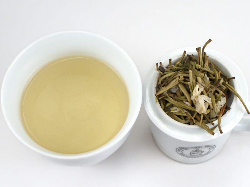 Infusion of Moli Yinzhen (Jasmine Needle) scented green tea and strained leaves.